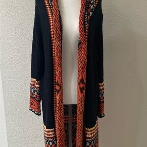 Bold Black and Orange Cardigan with Geometric Patterns